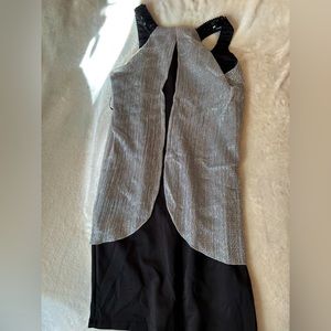 Black sequin draped dress with silver flow flaps 😂